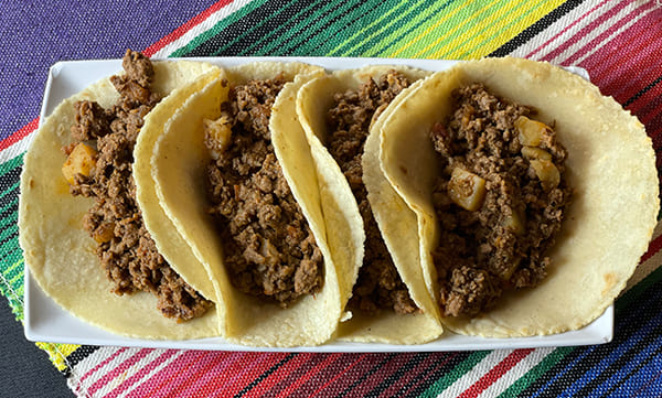 https://tostadaregia.com/wp-content/uploads/2022/09/tacos-de-guisado-picadillo-catering-express-tostada-regia.jpg
